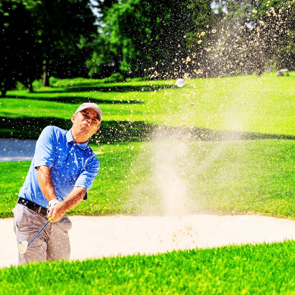 A golfer hitting a 54 degree wedge with optimal spin