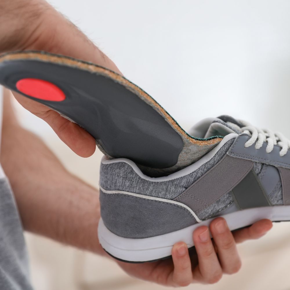 Women playing golf with comfortable shoes and arch support