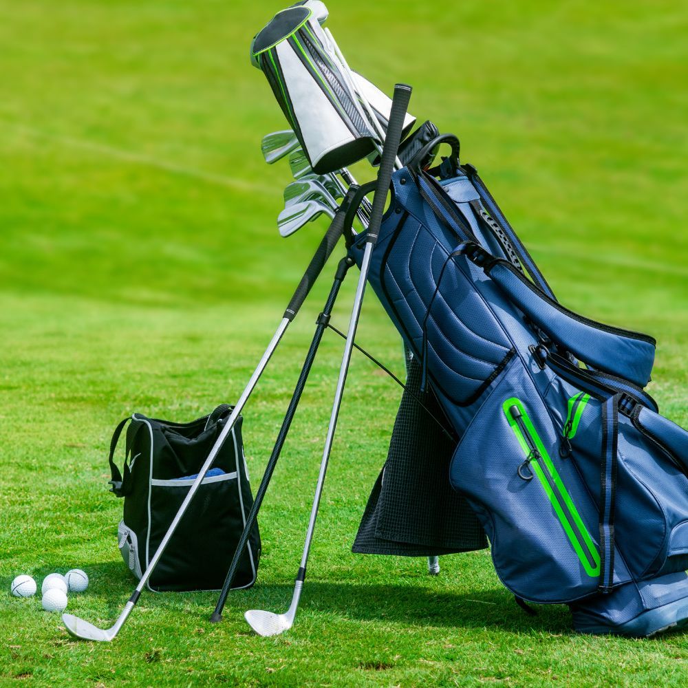 A golfer hitting a game improvement iron, with a graphite shaft, to improve turf interaction