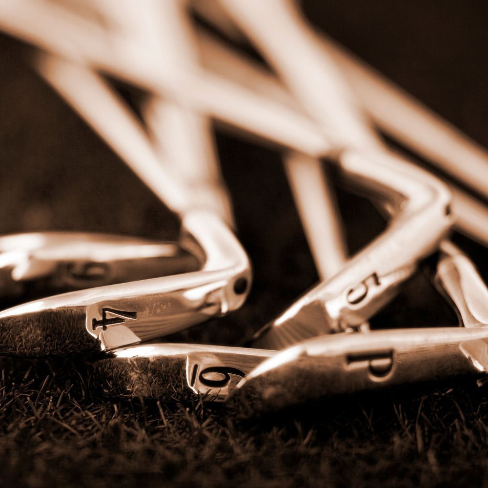 A golfer comparing Mizuno blades to cavity backs